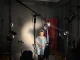 Thaïs posant sous les projecteurs du Studio Harcourt à Paris pendant sa séance photo